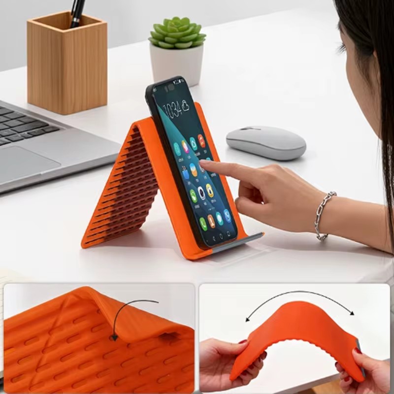 Desk Accessories - Uniwersalny, przenośny silikonowy stojak na telefon,
